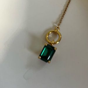Vintage Emerald Stone with Emerald cut in yellow gold plated metal.